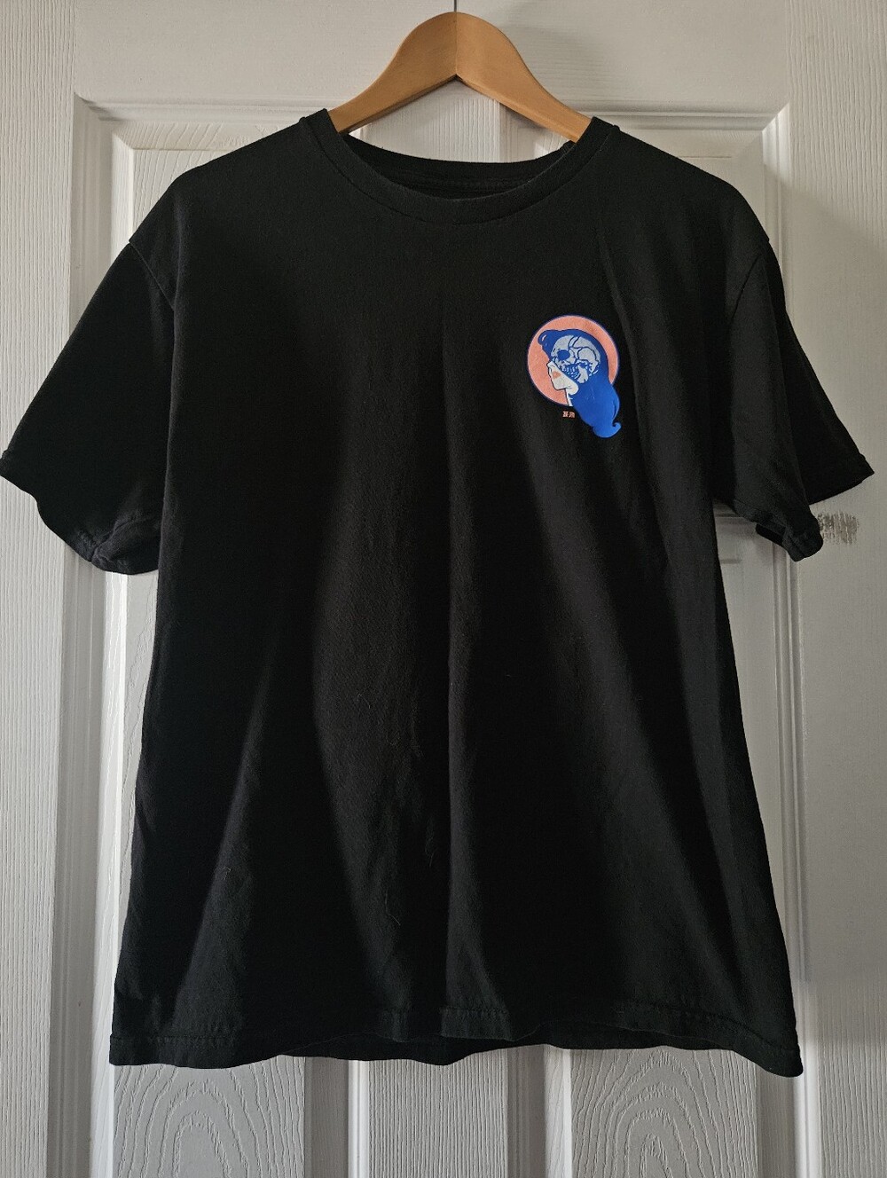 Never Made Black Graphic Tee with Blue & Pink Logo